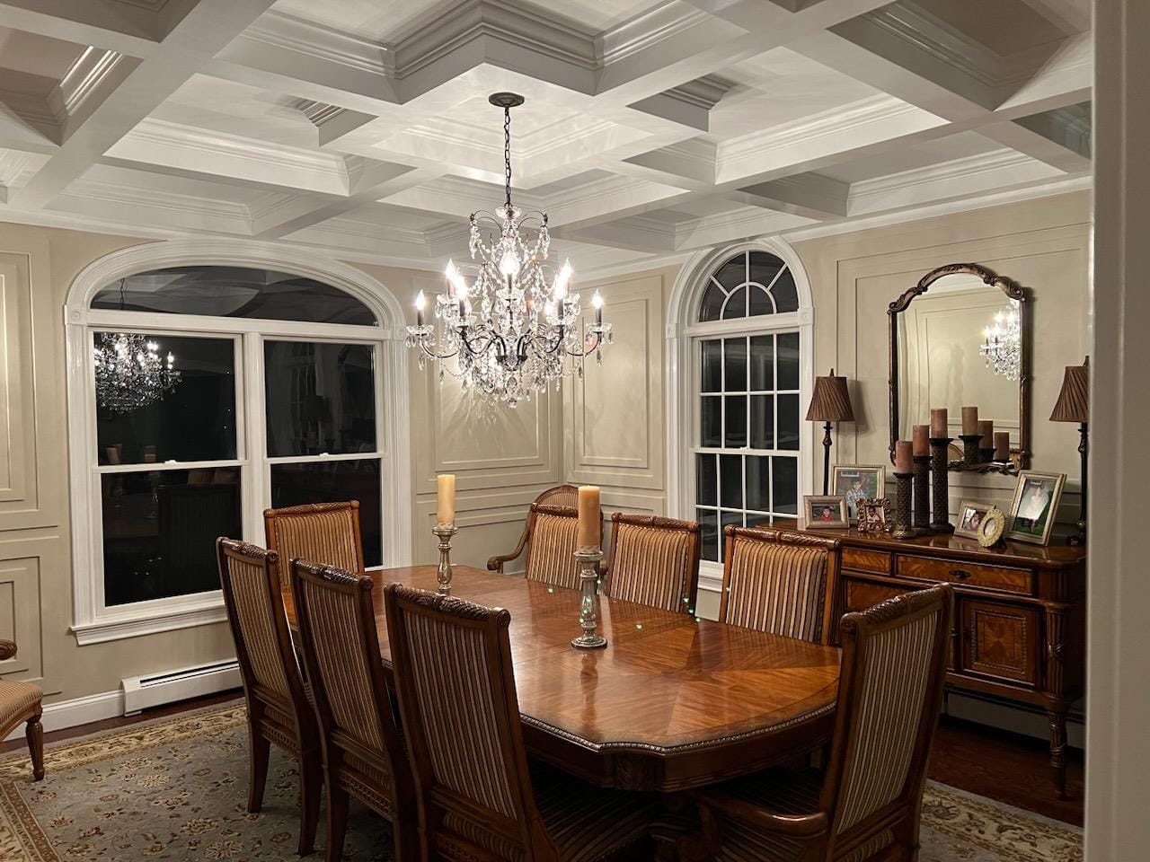 Freshly painted dining room with coffered ceiling and candlelight, ready for holiday entertaining